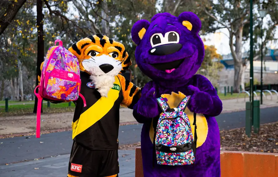 Children receiving Buddy Bags from the Alannah & Madeline Foundation